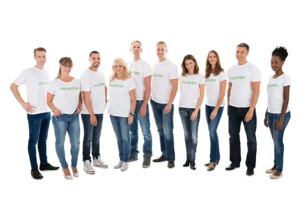 a picture of a group of adults wearing customized volunteer shirts